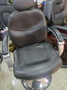  Reclining styling chair 8827 with imported leather, adjustable backrest, and ergonomic design for barbershop and salon use.