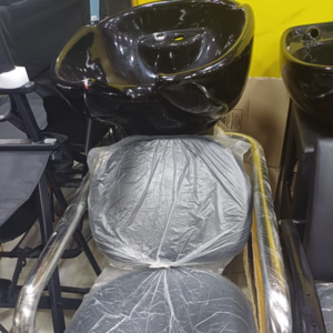 New York Muhindi Shampoo Unit with a comfortable reclining chair, sleek black basin, and durable frame, ideal for barbershops and salons.