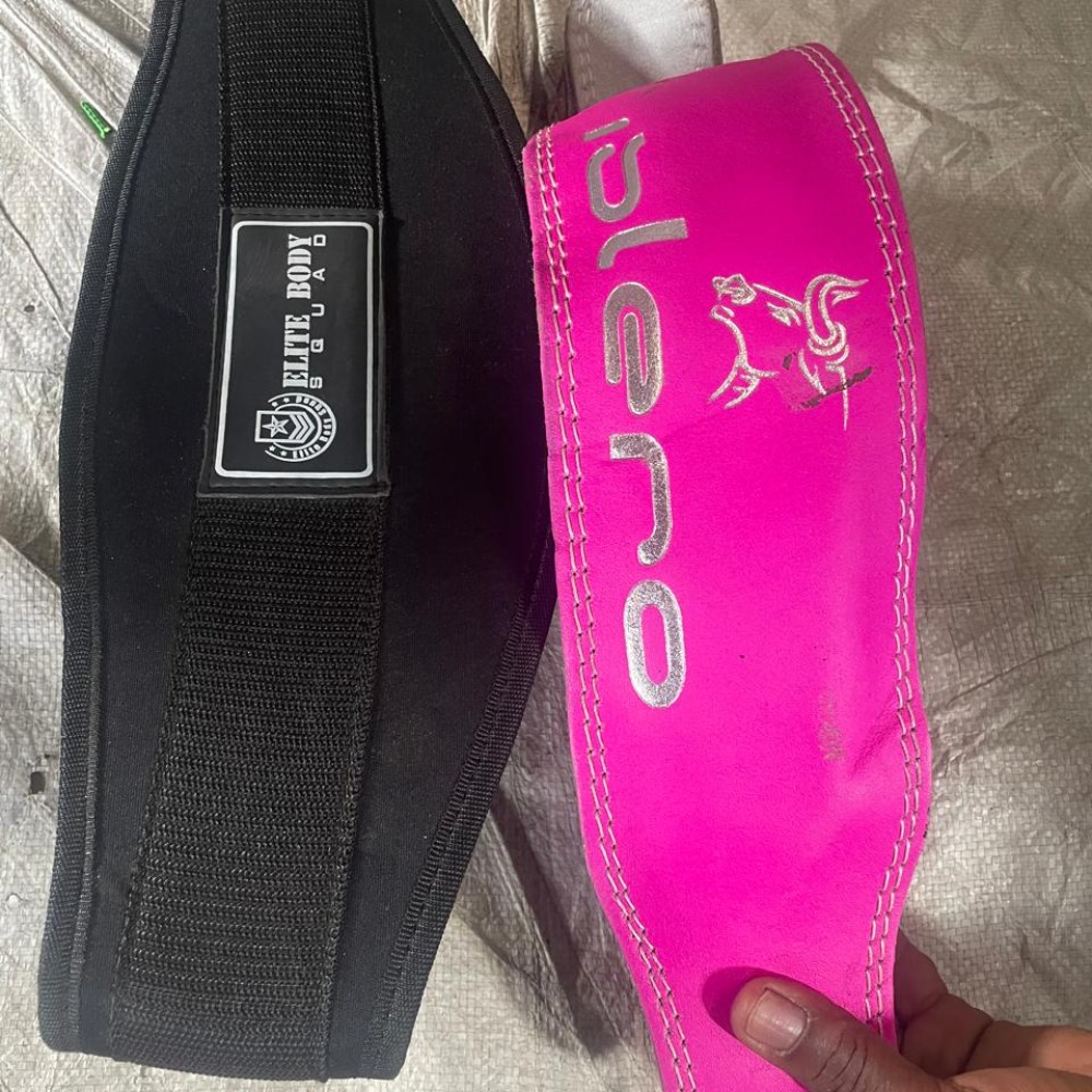 Adjustable ladies training belt for waist support and workout training.