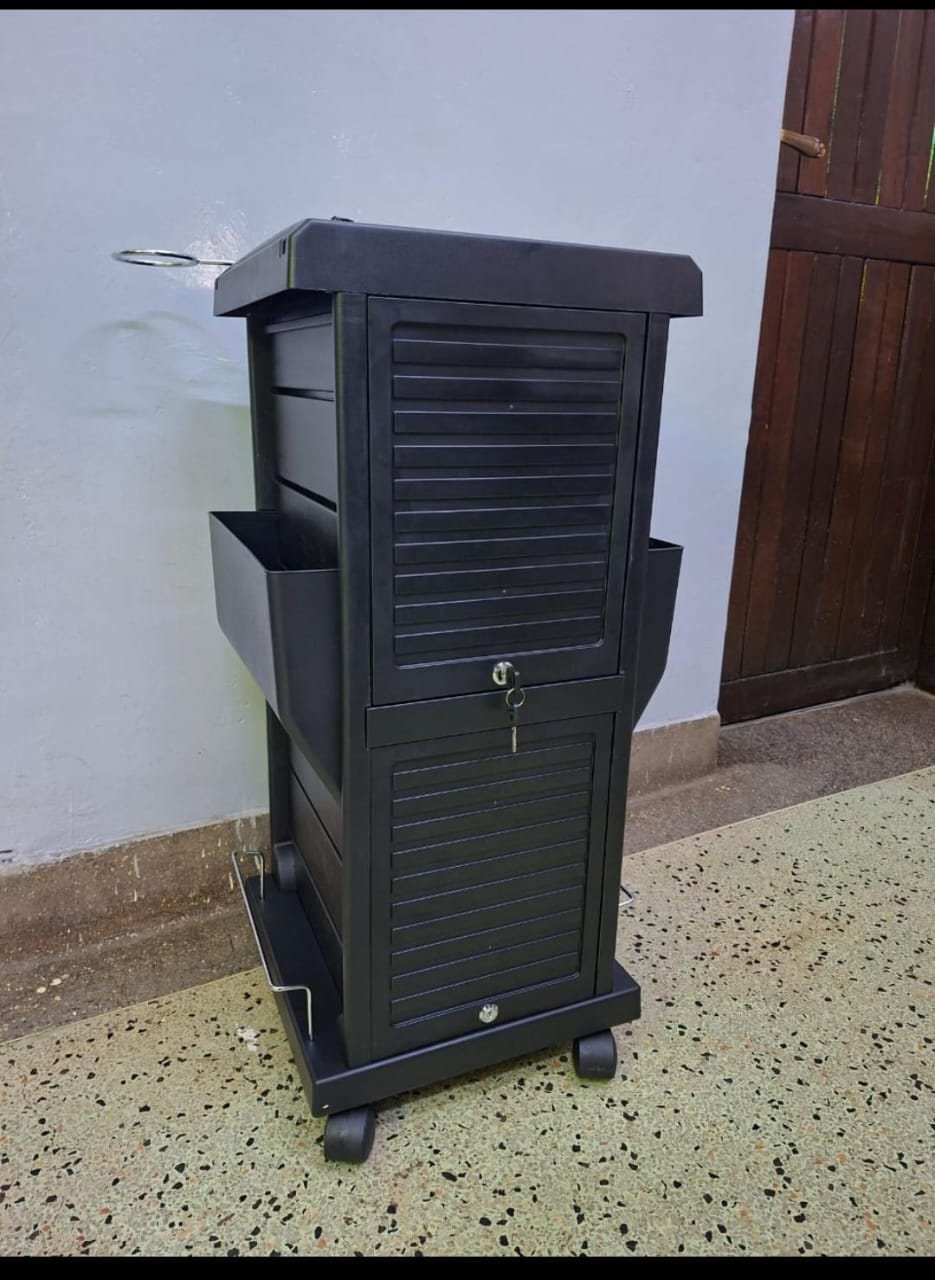 Lockable PVC salon trolley with drawers and wheels.