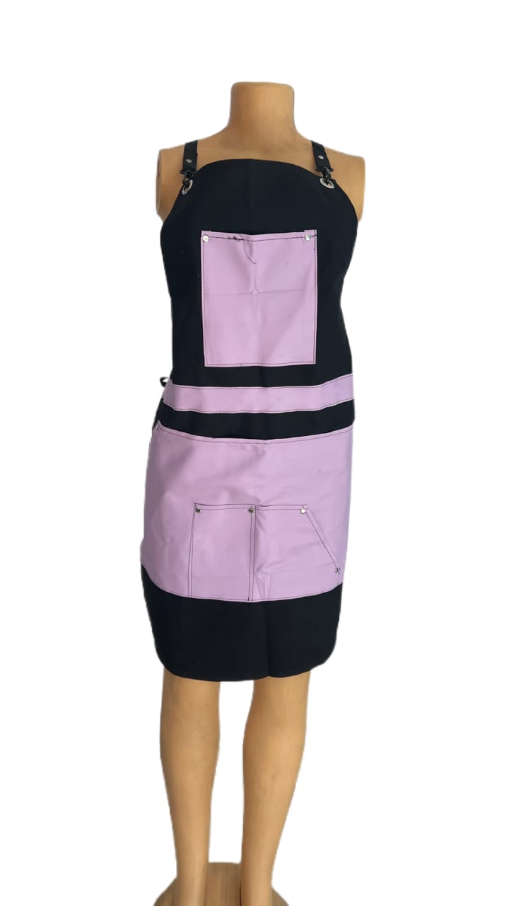 Purple leather stylist gown for professional salon and barbershop use.