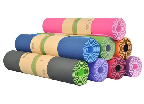 Cushioned non-slip workout mat laid flat on a gym floor